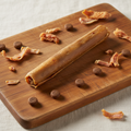 British Sausage Roll dog treat on white background – Reet Good Pet Treats